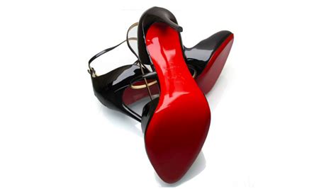 red sole shoes designer name